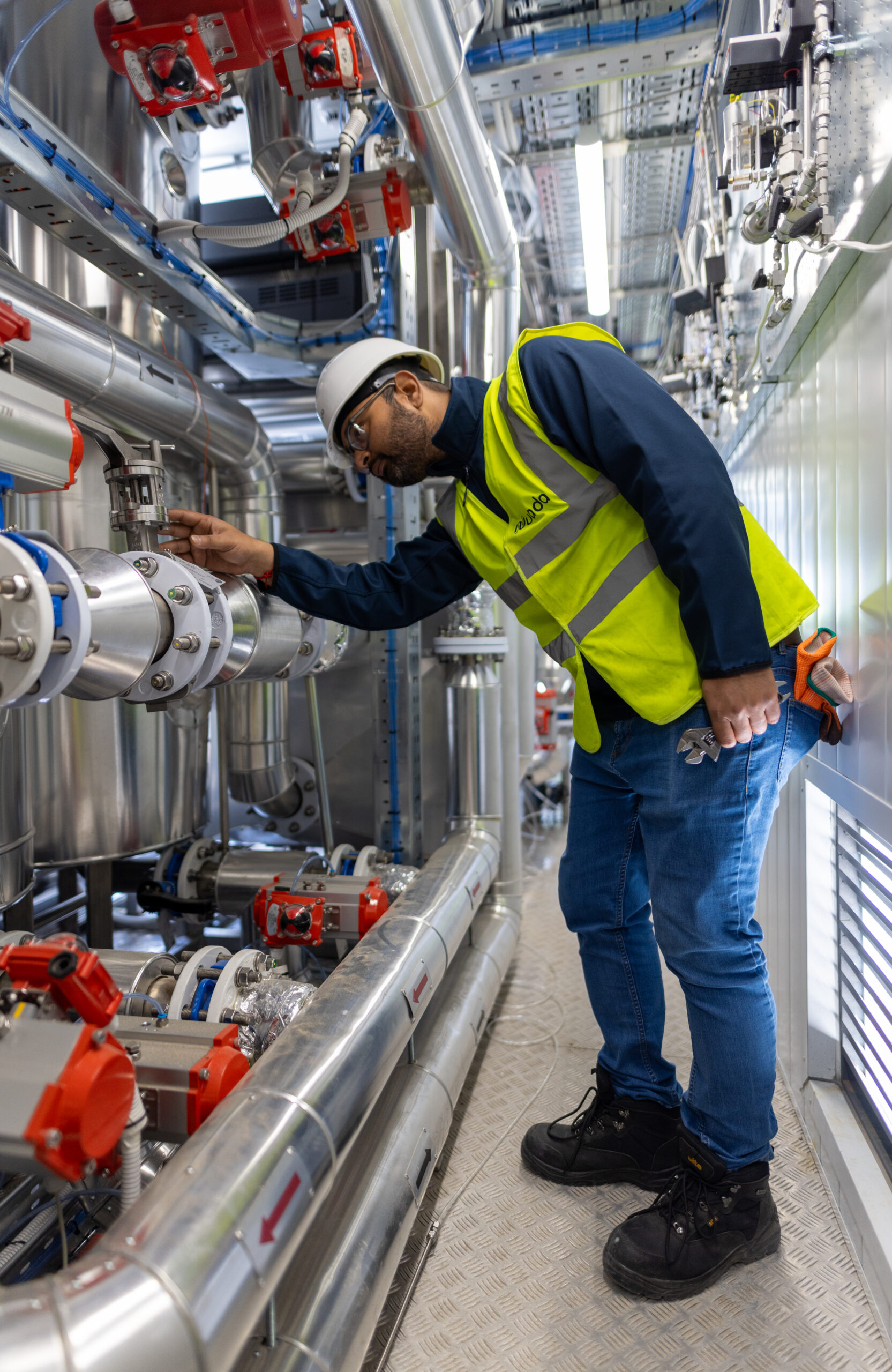 Nuada employee checking pipe